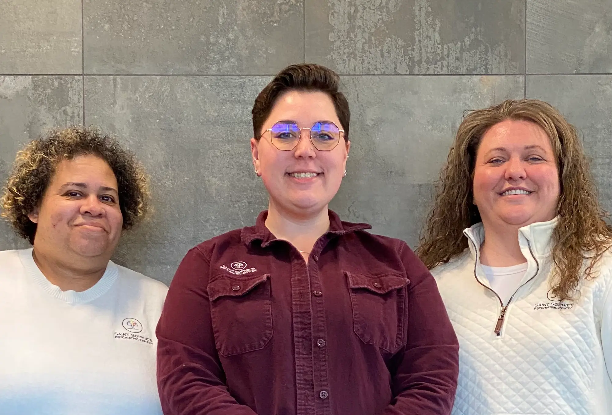 Ada, Morgan and Jyl, medical receptionists at Saint Sophie's, at the front desk