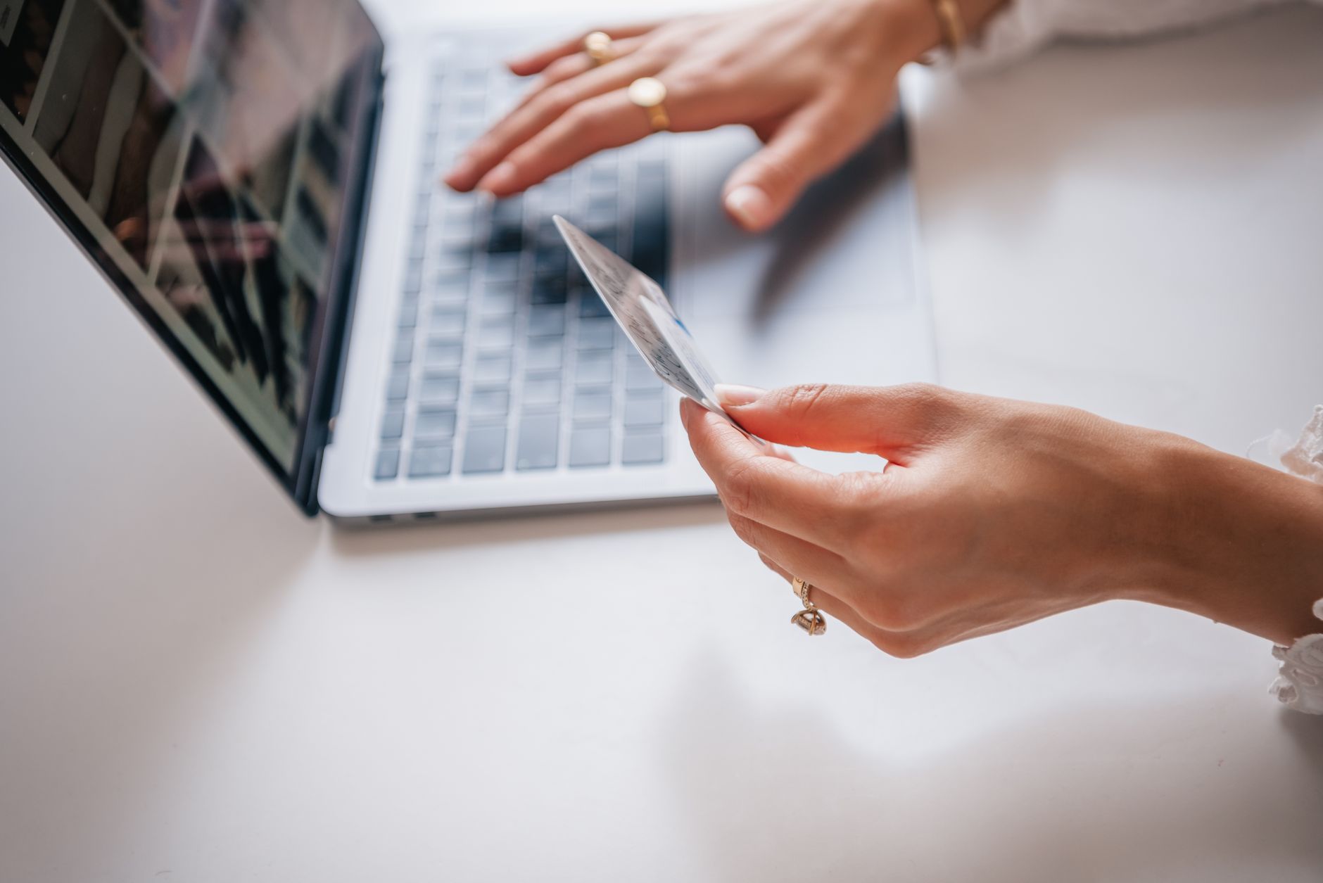 A person paying a bill on a laptop